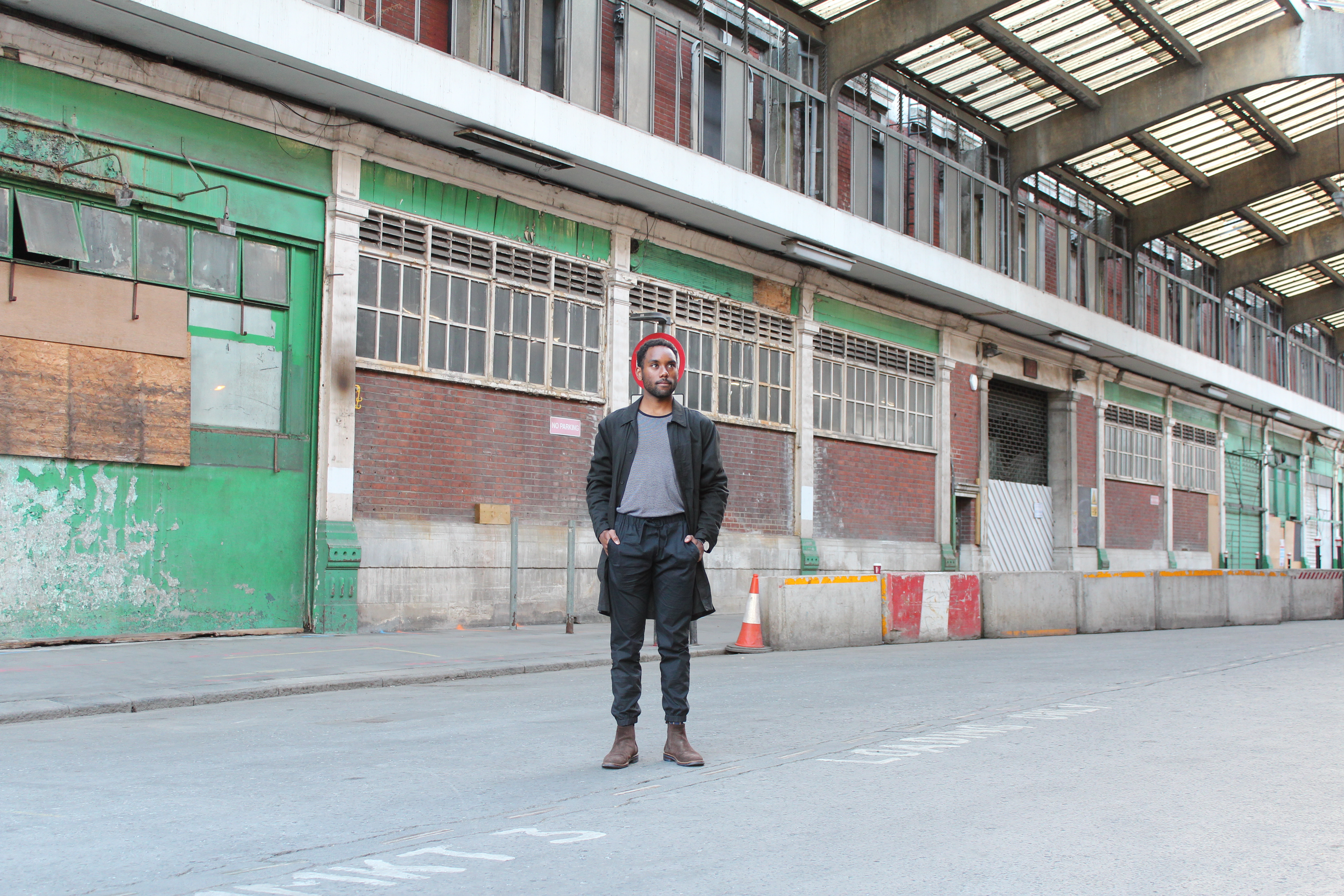Jordan Rowe standing in front of Smithfield Market