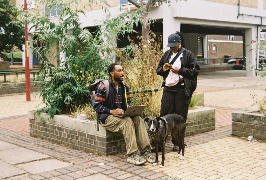 Jordan Rowe, Tega Okiti, and Narla (dog) on set